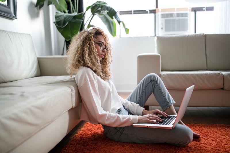 Lady On Laptop Cost Of Living